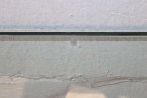 A lovely cane occasional/ coffee table with a removable glass top - stunning in a holiday home