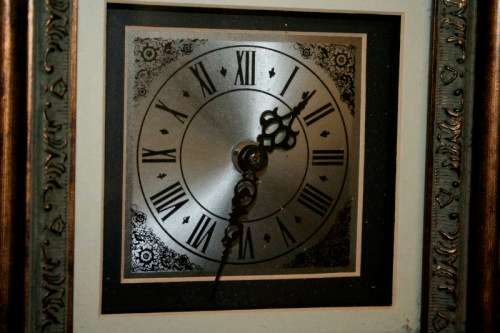 An amazing and unusual (quartz) wall clock in a stunning ornate moulded gilded frame - RS17CL