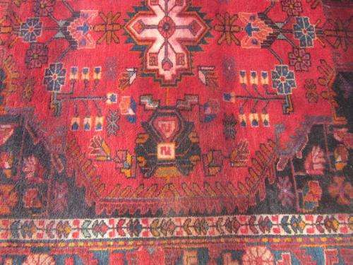 A wonderful vintage Persian Carpet (2.3m x 1.4m) in deep red, black and rust colours - stunning!