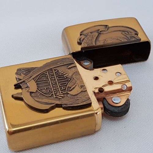 A stunning c1994 Zippo "Barrett Smythe" limited edition "Harley Davidson" Eagle brass lighter