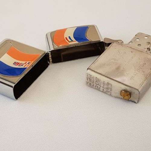 An amazing chromed (pre-1994) Republic of South Africa flag Zippo lighter in its box = UNUSED!!