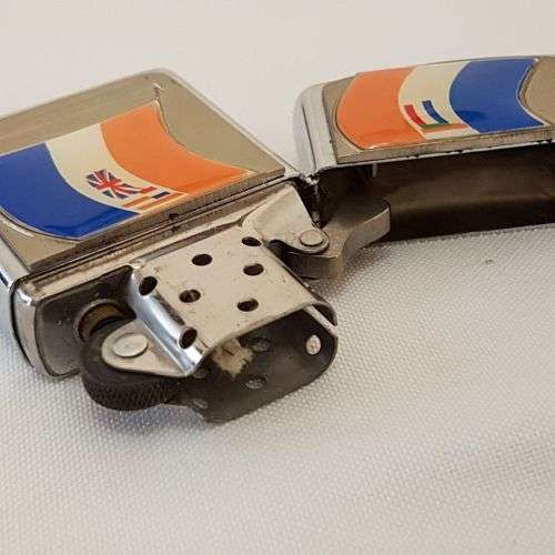 An amazing chromed (pre-1994) Republic of South Africa flag Zippo lighter in its box = UNUSED!!