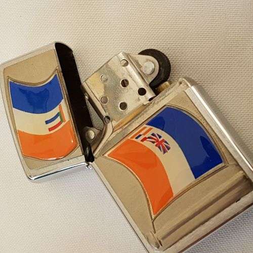 An amazing chromed (pre-1994) Republic of South Africa flag Zippo lighter in its box = UNUSED!!