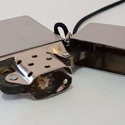 A stunning authentic Zippo "Classic brushed chrome" lighter in excellent condition in original box