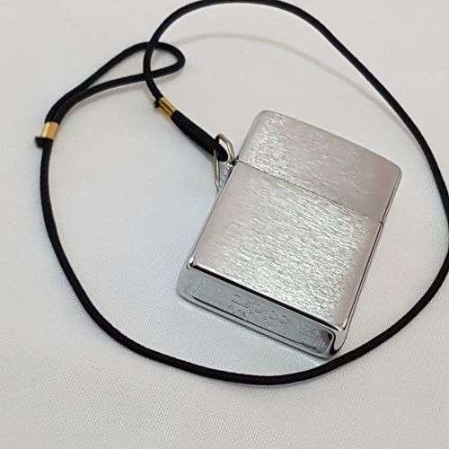 A stunning authentic Zippo "Classic brushed chrome" lighter in excellent condition in original box
