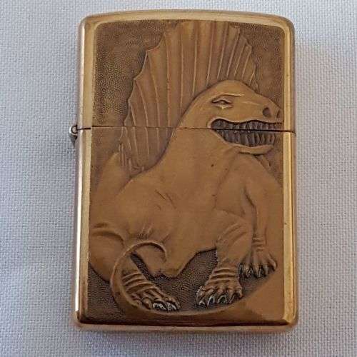 **RS17** A c1993 Zippo Barrett Smythe limited edition "Dinosaurs" Dimetrodon brass-finished lighter