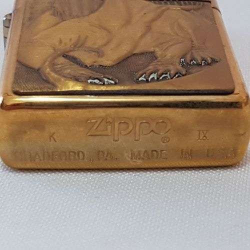 **RS17** A c1993 Zippo Barrett Smythe limited edition "Dinosaurs" Dimetrodon brass-finished lighter