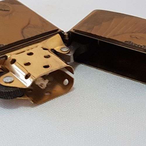 **RS17** A c1993 Zippo Barrett Smythe limited edition "Dinosaurs" Dimetrodon brass-finished lighter