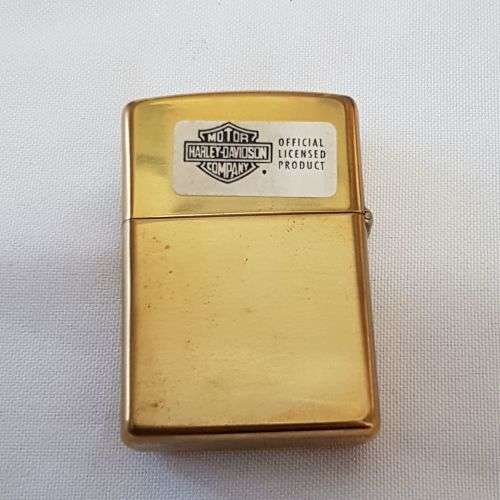 An amazing RARE (UNUSED) polished brass Barrett Smythe (Harley Davidson) "Viking" Zippo lighter