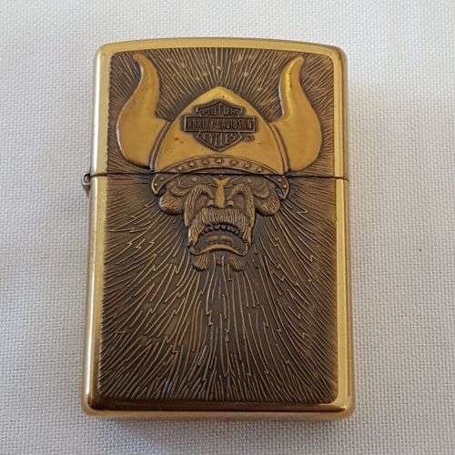 An amazing RARE (UNUSED) polished brass Barrett Smythe (Harley Davidson) "Viking" Zippo lighter