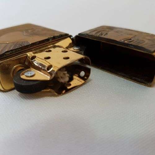 **RS17** An unused solid brass Harley Davidson "Girl with Harley Davidson earrings" Zippo lighter