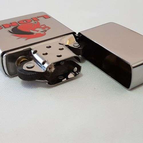 An awesome Original Zippo "South African Rugby" LIONS brushed chrome lighter
