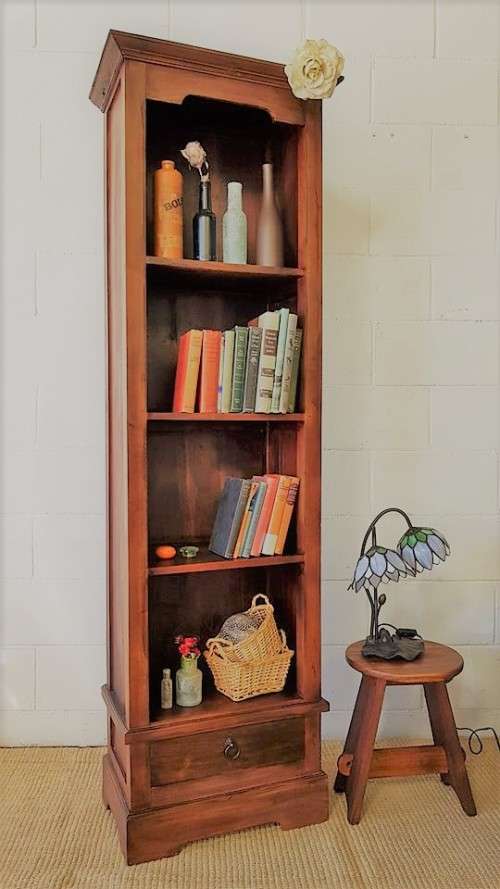 An incredible tall wooden bookcase with three spacious shelves and a bottom drawer - stunning!!