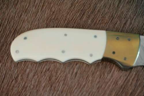 Incredible custom made Mike Skellern Damascus steel & bone handle knife w/ brass embellishments