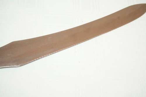 A stunning vintage boxed bone handle style carving knife and fork set with a sharpening steel