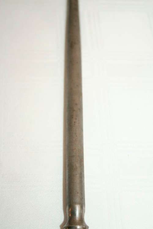 A stunning vintage boxed bone handle style carving knife and fork set with a sharpening steel