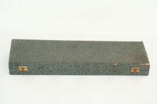 A stunning vintage boxed bone handle style carving knife and fork set with a sharpening steel