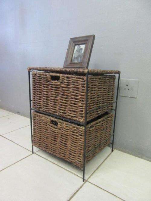 A wonderful metal and wicker pedestal/ bedside cabinet with two basket drawers in good condition!!