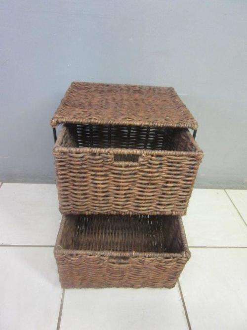 A wonderful metal and wicker pedestal/ bedside cabinet with two basket drawers in good condition!!
