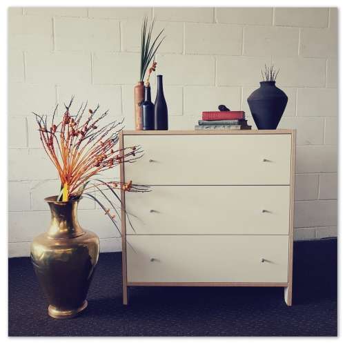 **RS17** A modern styled white & cedar colour 3-drawer chest of drawers with ample storage space