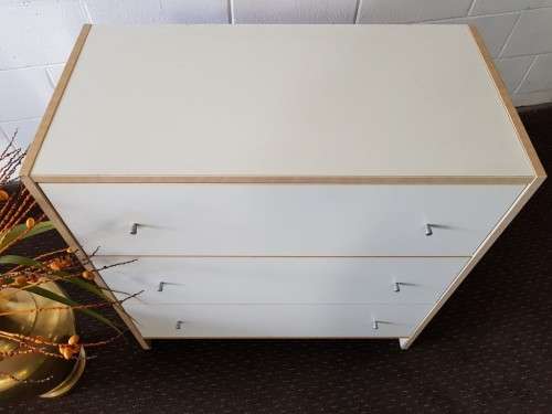**RS17** A modern styled white & cedar colour 3-drawer chest of drawers with ample storage space
