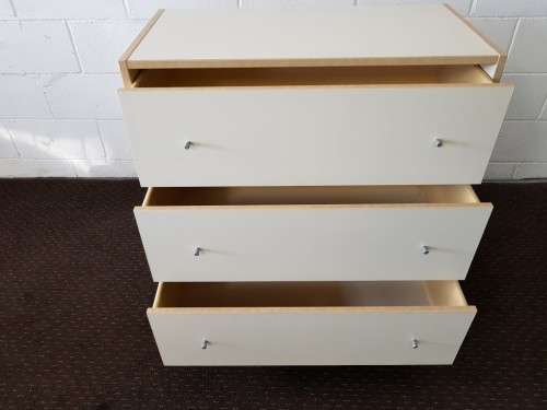 **RS17** A modern styled white & cedar colour 3-drawer chest of drawers with ample storage space