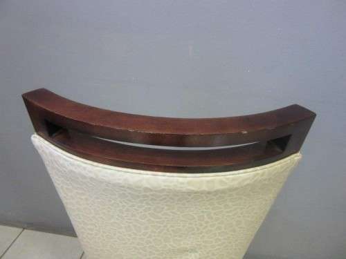 A stunning and extremely stylish high-back occasional chair in a superb patent-leather feel fabric