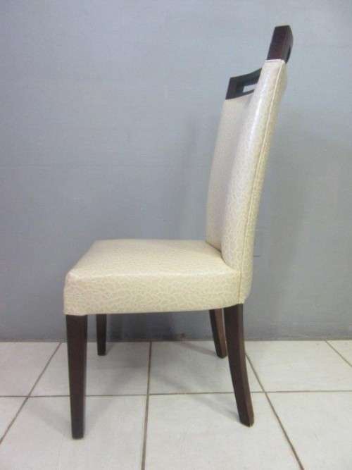 A stunning and extremely stylish high-back occasional chair in a superb patent-leather feel fabric