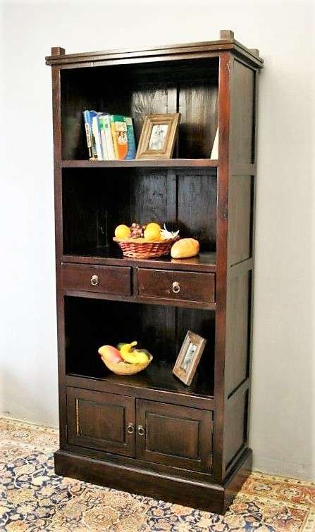 A wonderful tall teak display cabinet/ bookcase with shelves, storage cupboards and drawers