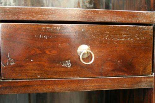 A wonderful tall teak display cabinet/ bookcase with shelves, storage cupboards and drawers