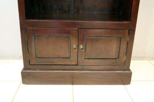 A wonderful tall teak display cabinet/ bookcase with shelves, storage cupboards and drawers
