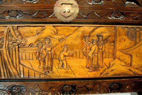 A superb & exquisitely made oriental teak and camphor wood hand carved kist w/ brass embellishments