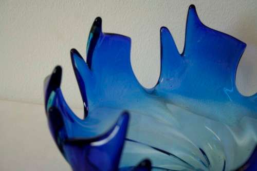 Spectacular & beautifully made LRG blue layered glass bowl w/ a flame appearance in great condition