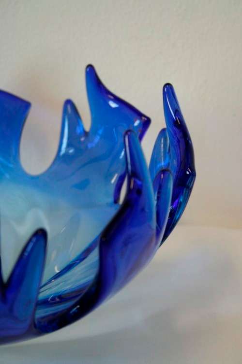 Spectacular & beautifully made LRG blue layered glass bowl w/ a flame appearance in great condition