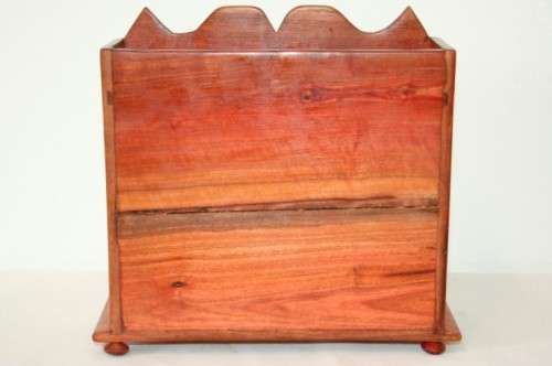 A gorgeous hand made solid teak jewellery box with six drawers and a storage section on top