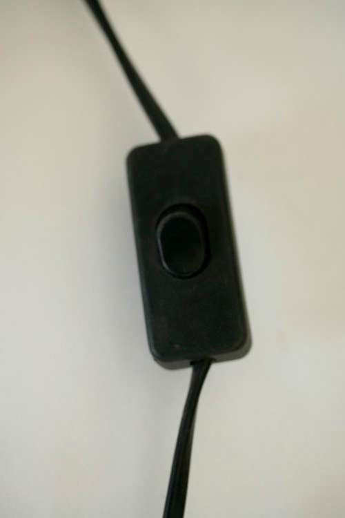 An incredible "Pyramid" Himalayan Crystal Salt lamp on a wooden base in complete working condition