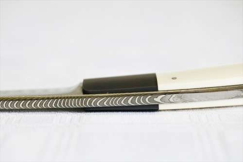 A beautifully made original Willie Paulsen Warthog Ivory-handle knife with Damascus steel blade!!