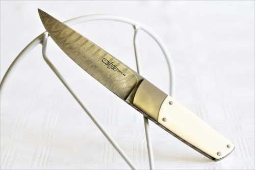 A magnificent handmade original Corrie Schoeman Ivory-handle knife with Damascus steel blade!!