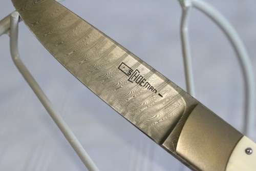 A magnificent handmade original Corrie Schoeman Ivory-handle knife with Damascus steel blade!!