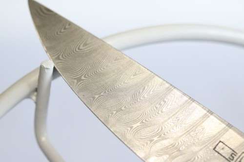 A magnificent handmade original Corrie Schoeman Ivory-handle knife with Damascus steel blade!!