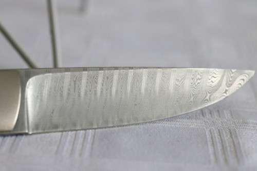 A magnificent handmade original Corrie Schoeman Ivory-handle knife with Damascus steel blade!!