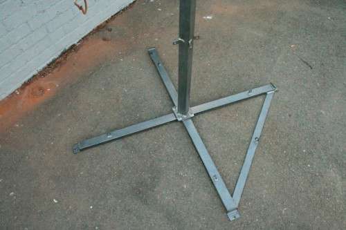 A well made steel boxing stand with a "SNT" punching bag and an "Everlast" speed bag = for home use!