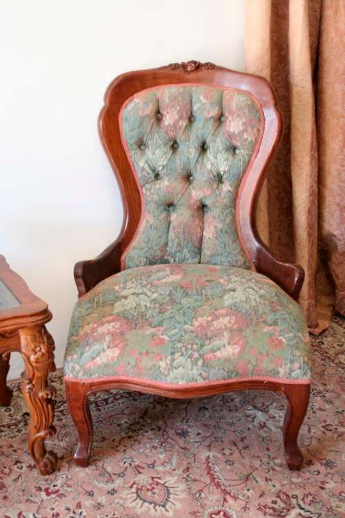 Wow! Magnificent pair of Victorian "king and queen" hand carved chairs with deep button detailing!