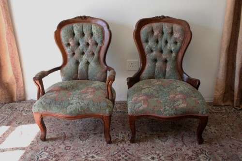 Wow! Magnificent pair of Victorian "king and queen" hand carved chairs with deep button detailing!