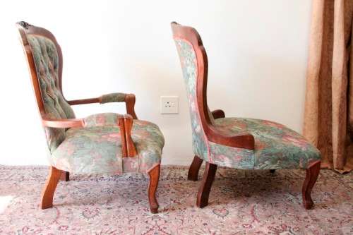 Wow! Magnificent pair of Victorian "king and queen" hand carved chairs with deep button detailing!