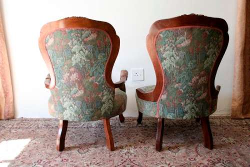 Wow! Magnificent pair of Victorian "king and queen" hand carved chairs with deep button detailing!