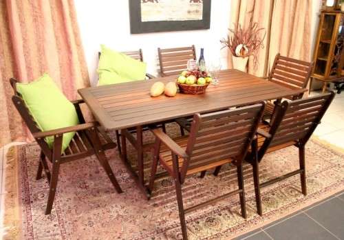A fabulous modern slatted Teak 6-seater patio/garden set including six cushions.