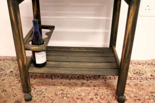 A lovely shabby chic drinks/ tea trolley on castors in good condition - awesome in informal areas!