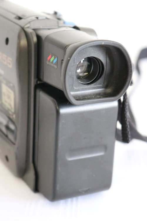 A Panasonic NV-R55 VHS movie camera with battery, charger and one cassette - in working condition!