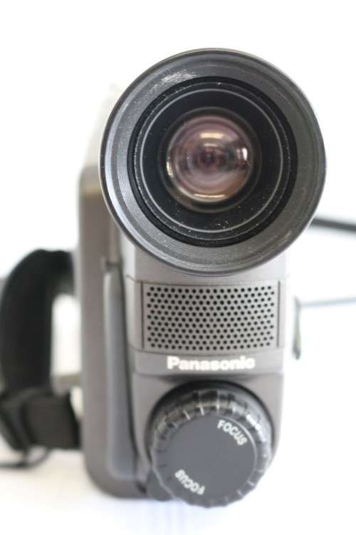 A Panasonic NV-R55 VHS movie camera with battery, charger and one cassette - in working condition!